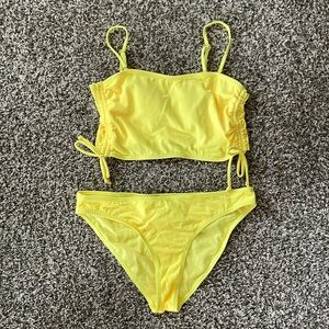 Never worn bright yellow bikini top size L bottom size XL